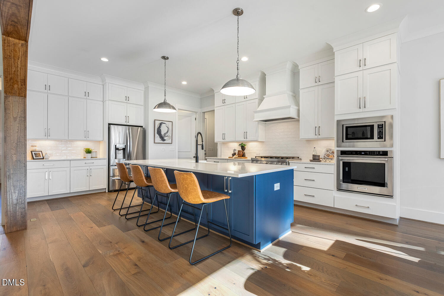 2321 Toll Mill Court Raleigh, NC 27606 - Photo 15 of 82 a large kitchen with stainless steel appliances kitchen island granite countertop a stove a sink a oven a dining table and chairs