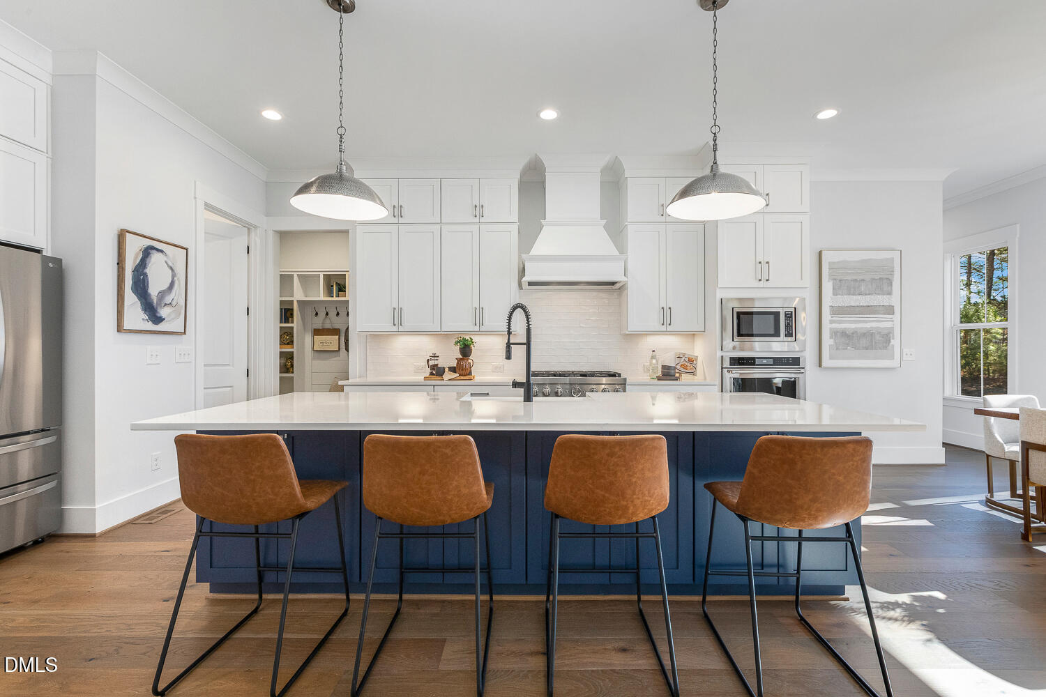 2321 Toll Mill Court Raleigh, NC 27606 - Photo 16 of 82 a large kitchen with a table and chairs in it