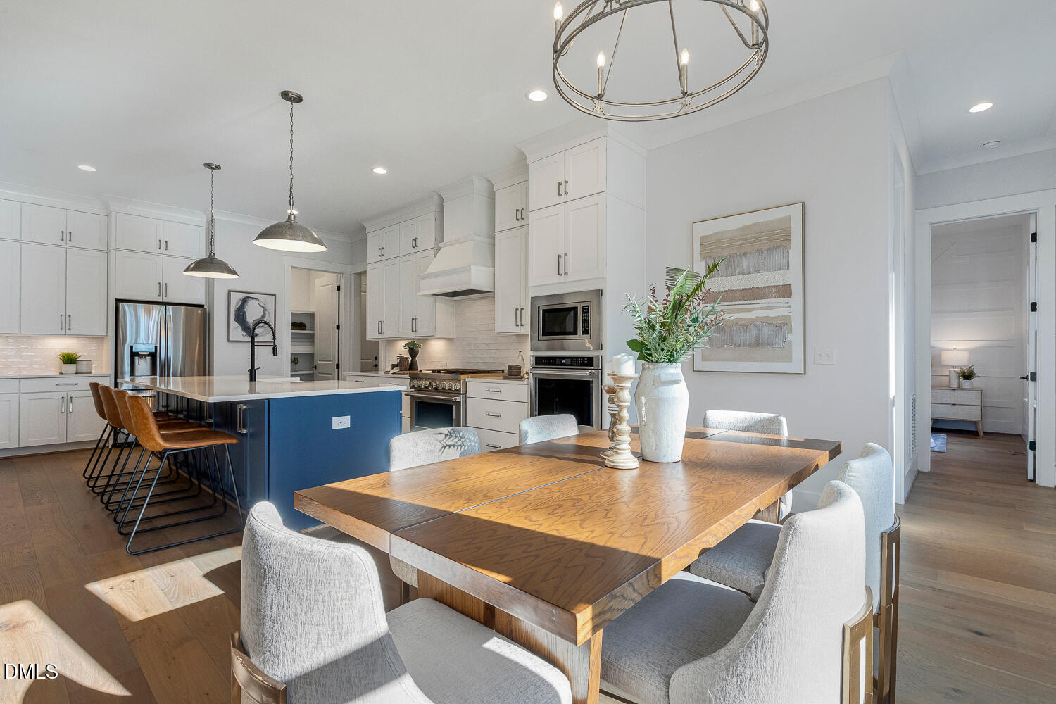 2321 Toll Mill Court Raleigh, NC 27606 - Photo 28 of 82 a kitchen with stainless steel appliances kitchen island granite countertop a table chairs and a kitchen view