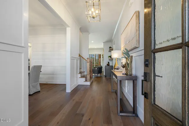 a view of entryway with wooden floor