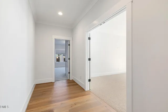 a view of balcony with wooden floor
