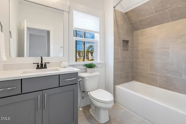 an aerial view of a house with swimming pool