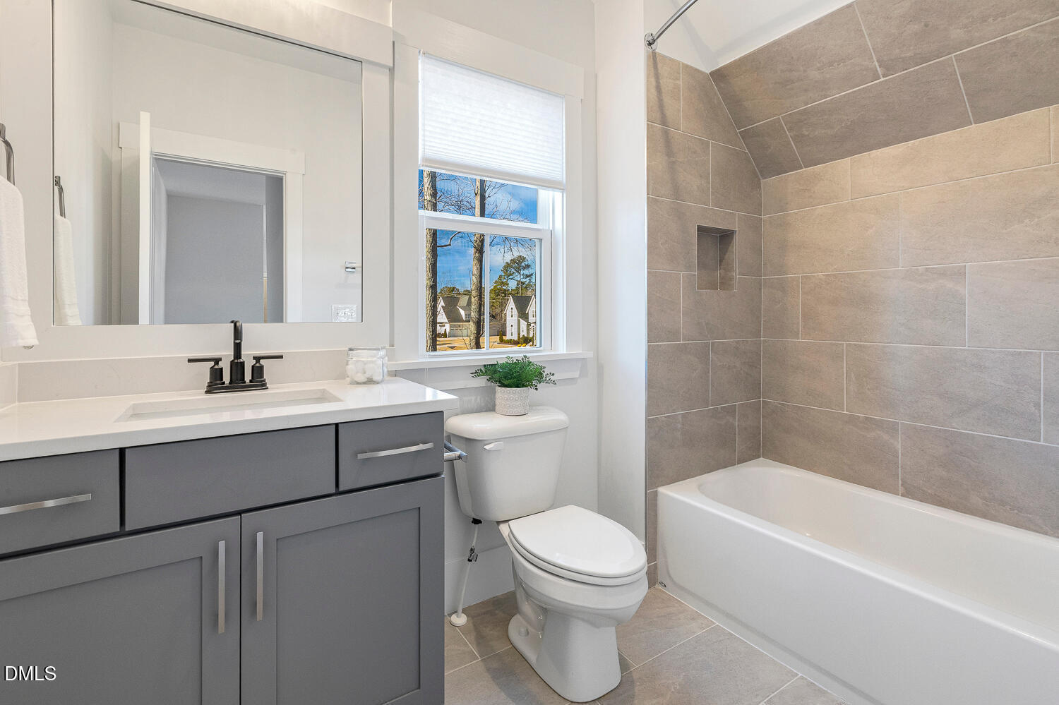 2321 Toll Mill Court Raleigh, NC 27606 - Photo 56 of 82 a bathroom with a sink a toilet and shower