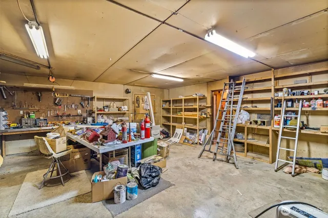 an aerial view of a house with outdoor space
