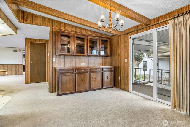 a kitchen with a sink stove and refrigerator