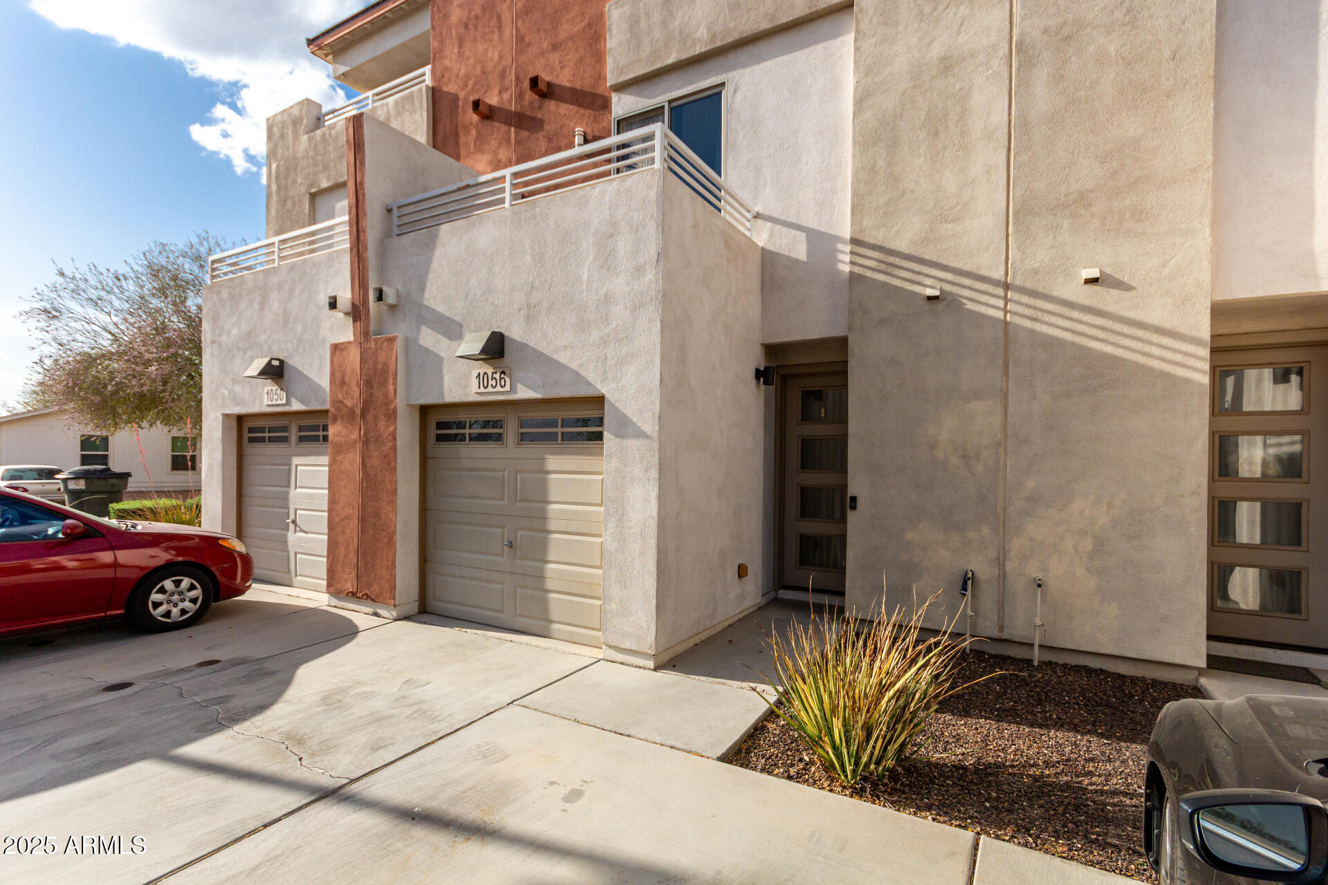 1056 North Miller Road Tempe, AZ 85288 - Photo 35 of 46 a view of a car park in front of house