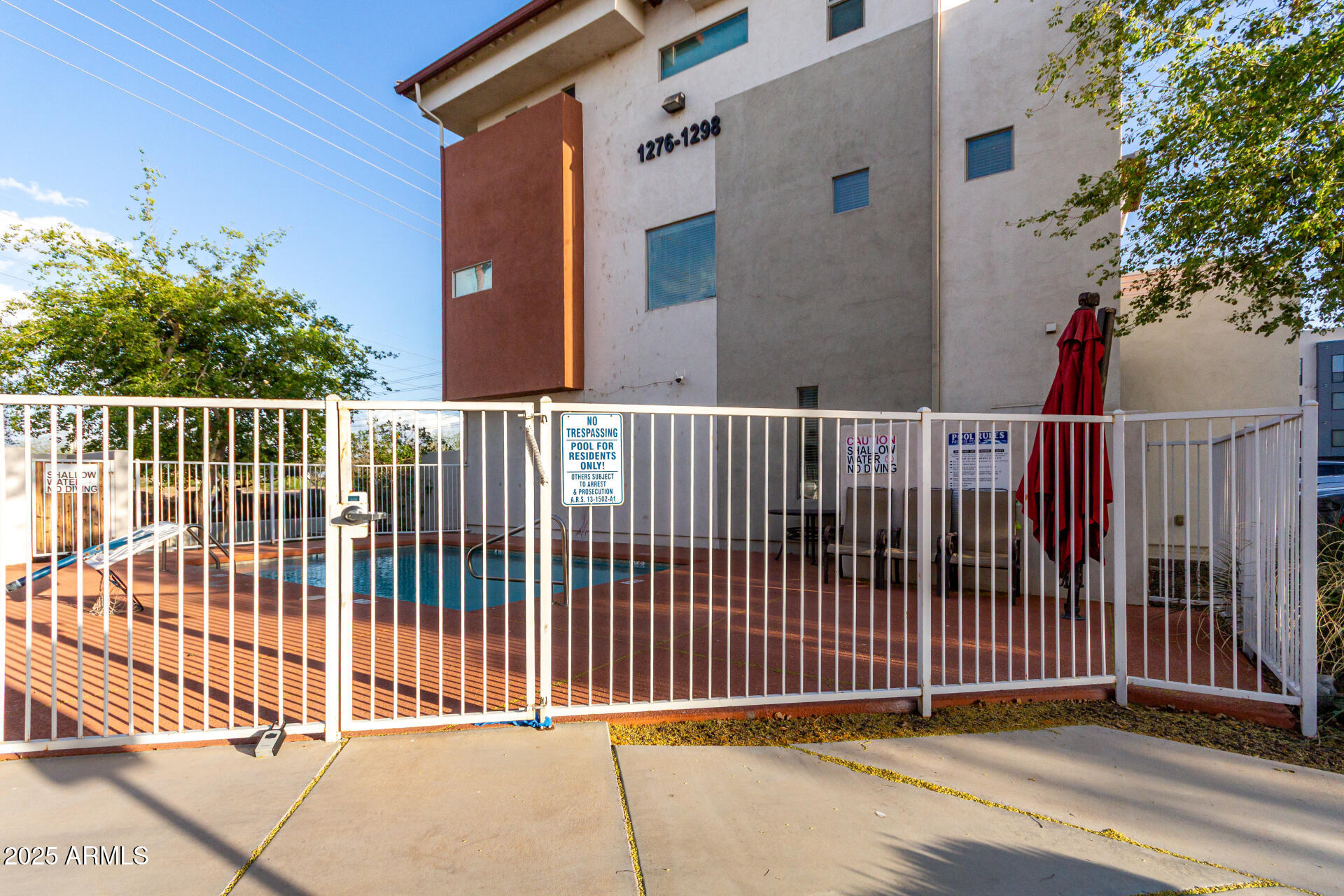 1056 North Miller Road Tempe, AZ 85288 - Photo 43 of 46 a view of a balcony with wooden floor