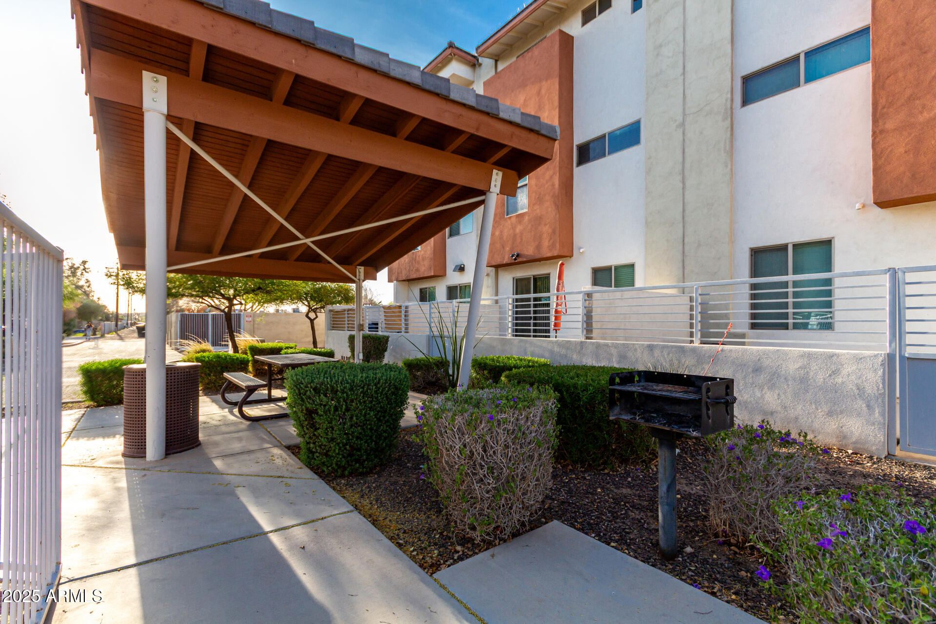 1056 North Miller Road Tempe, AZ 85288 - Photo 44 of 46 a view of a chairs and table in the patio