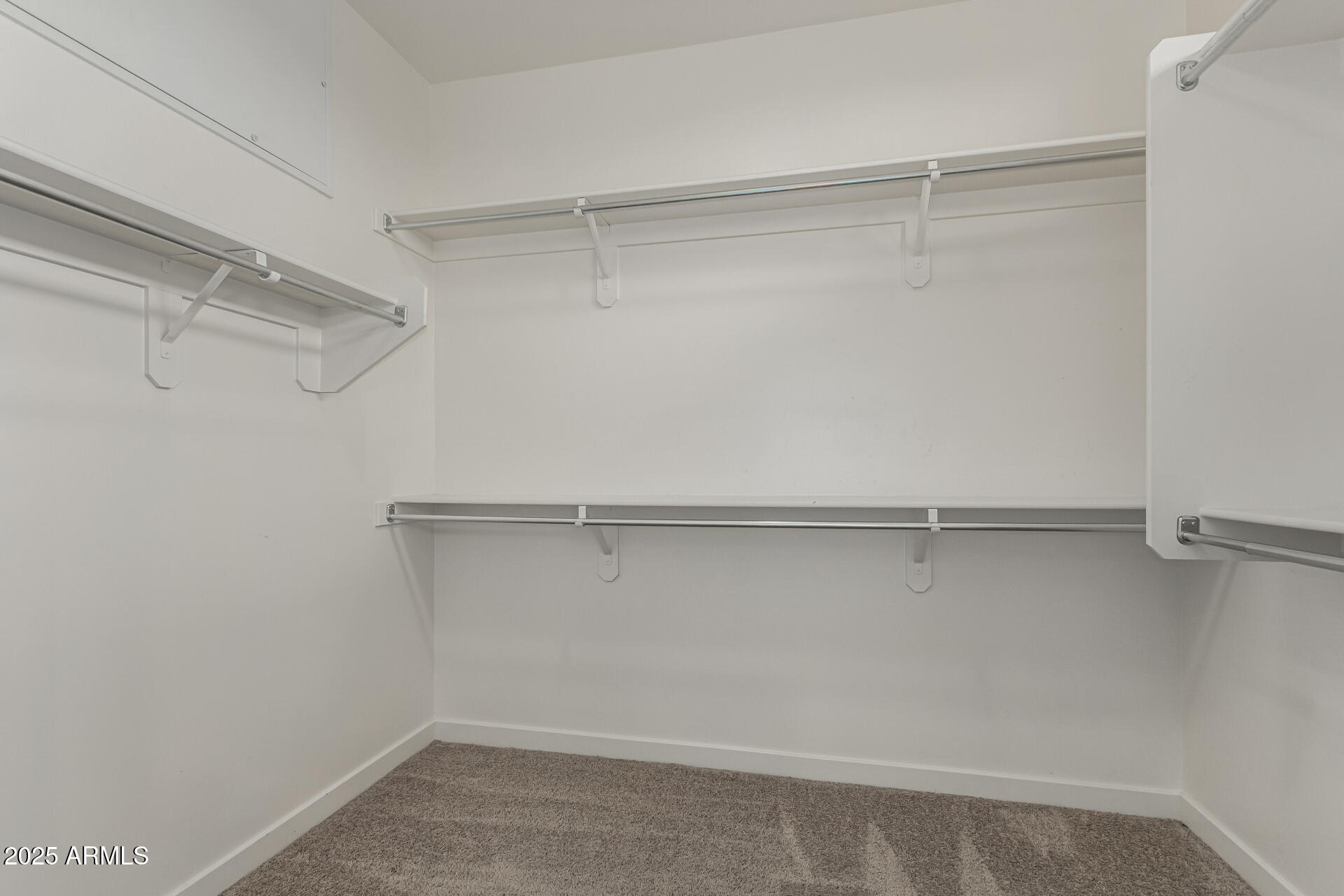 1056 North Miller Road Tempe, AZ 85288 - Photo 10 of 46 a view of an empty walk in closet