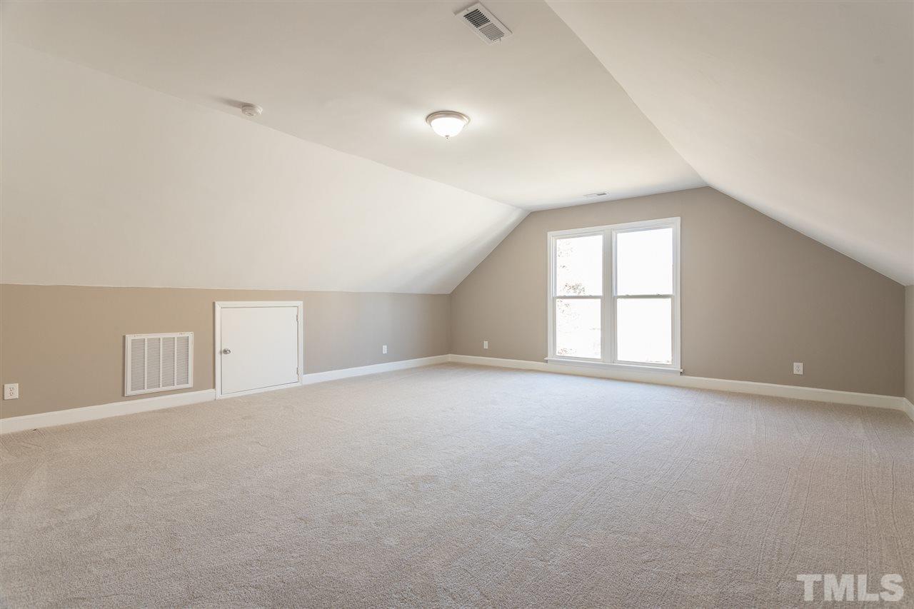 4556 Birmingham Way Raleigh, NC 27604 - Photo 16 of 24 an empty room with a window