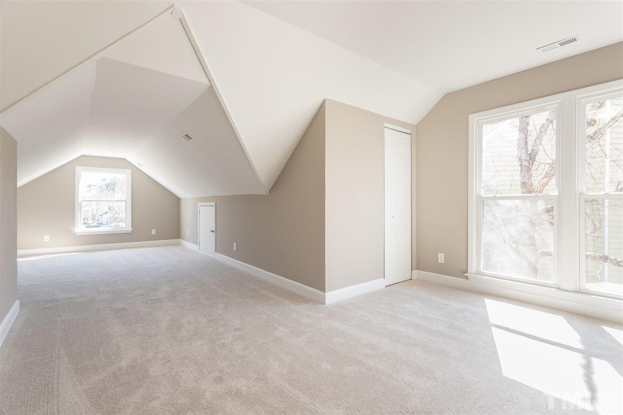 4556 Birmingham Way Raleigh, NC 27604 - Photo 17 of 24 a view of an empty room with a window