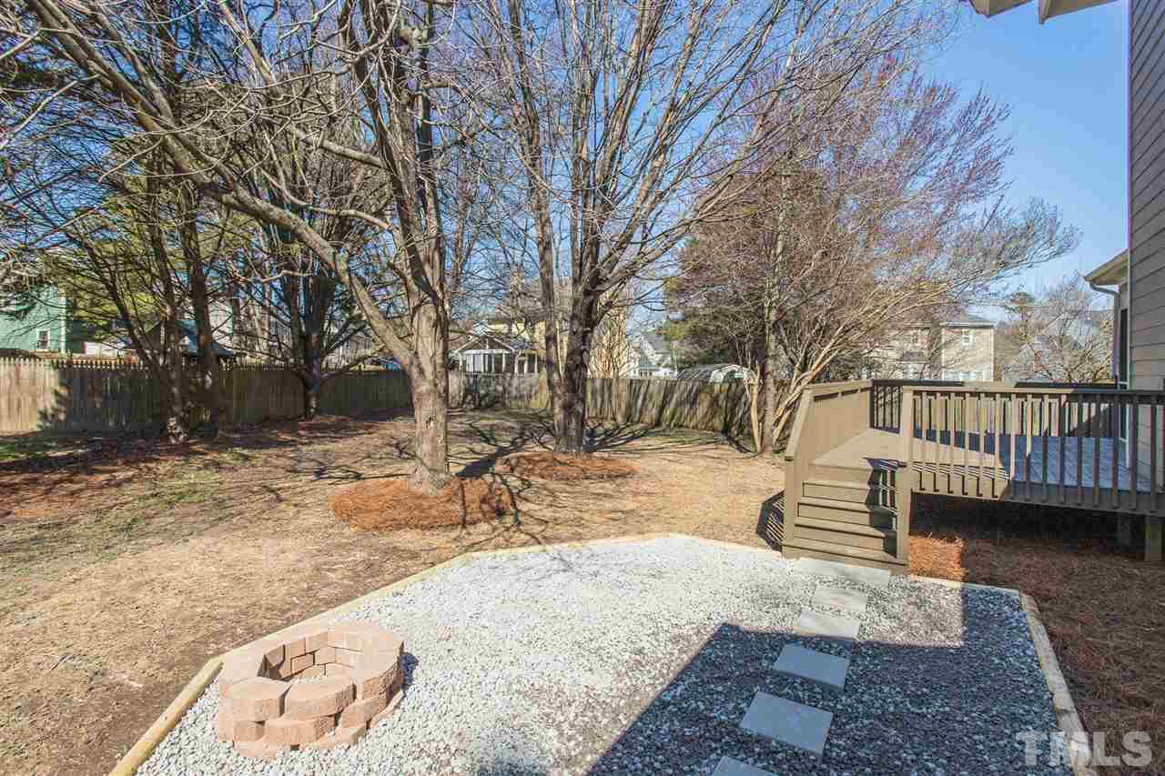 4556 Birmingham Way Raleigh, NC 27604 - Photo 23 of 24 a view of a house with yard covered in snow