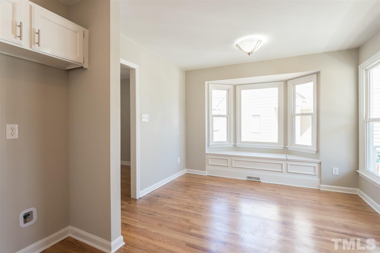 4556 Birmingham Way Raleigh, NC 27604 - Photo 9 of 24 a view of empty room with wooden floor and fan