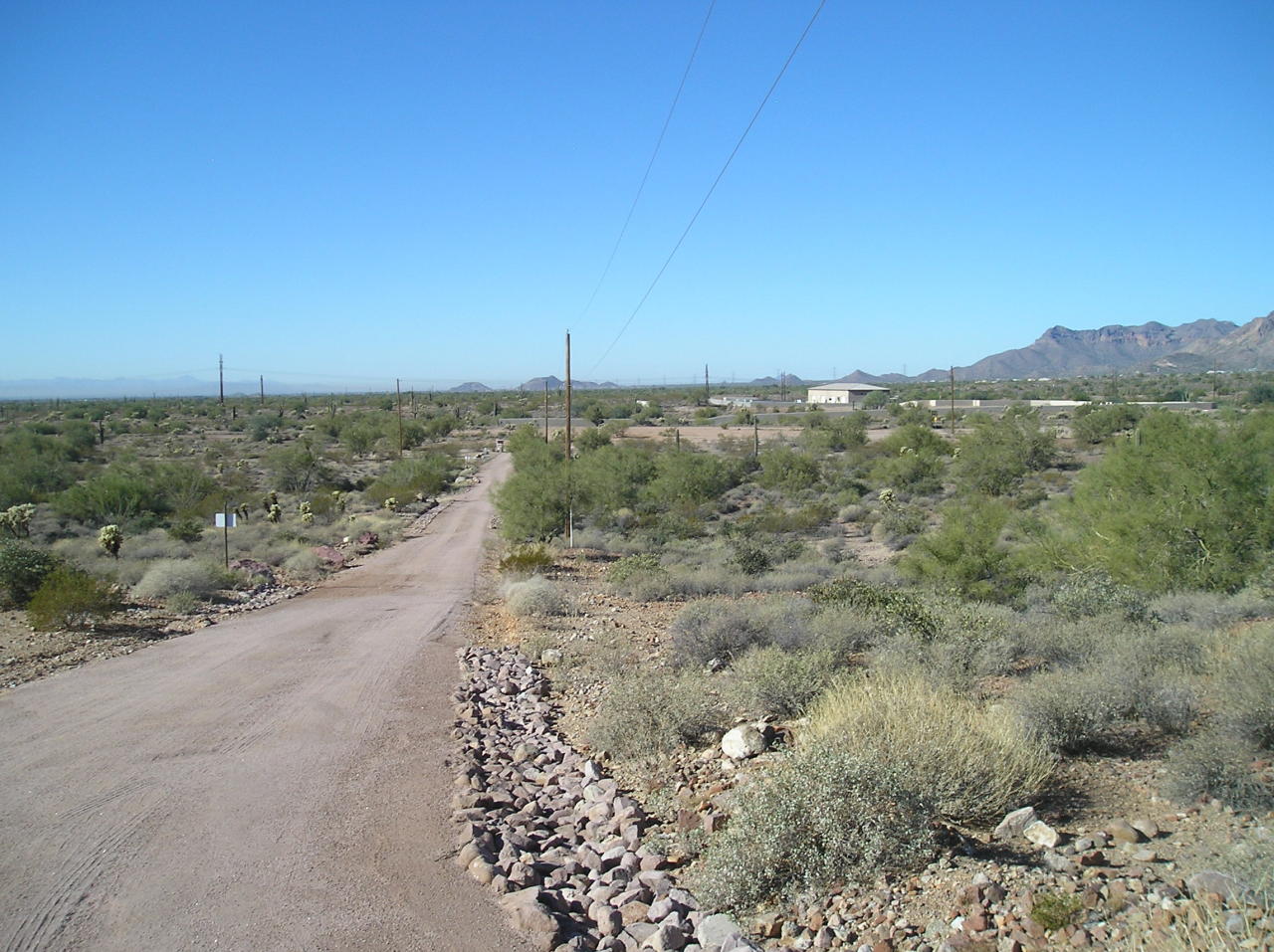 3250 North Mountain View Road, Unit 1 Apache Junction, AZ 85119 - Photo 3 of 13 Looking West Property on Right Side