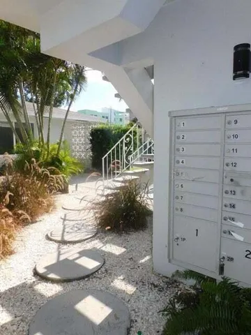 a patio with table and chairs