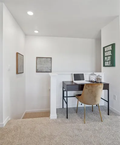 a workspace with furniture and a couch