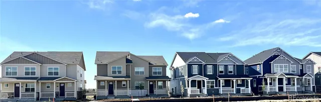 a front view of residential houses