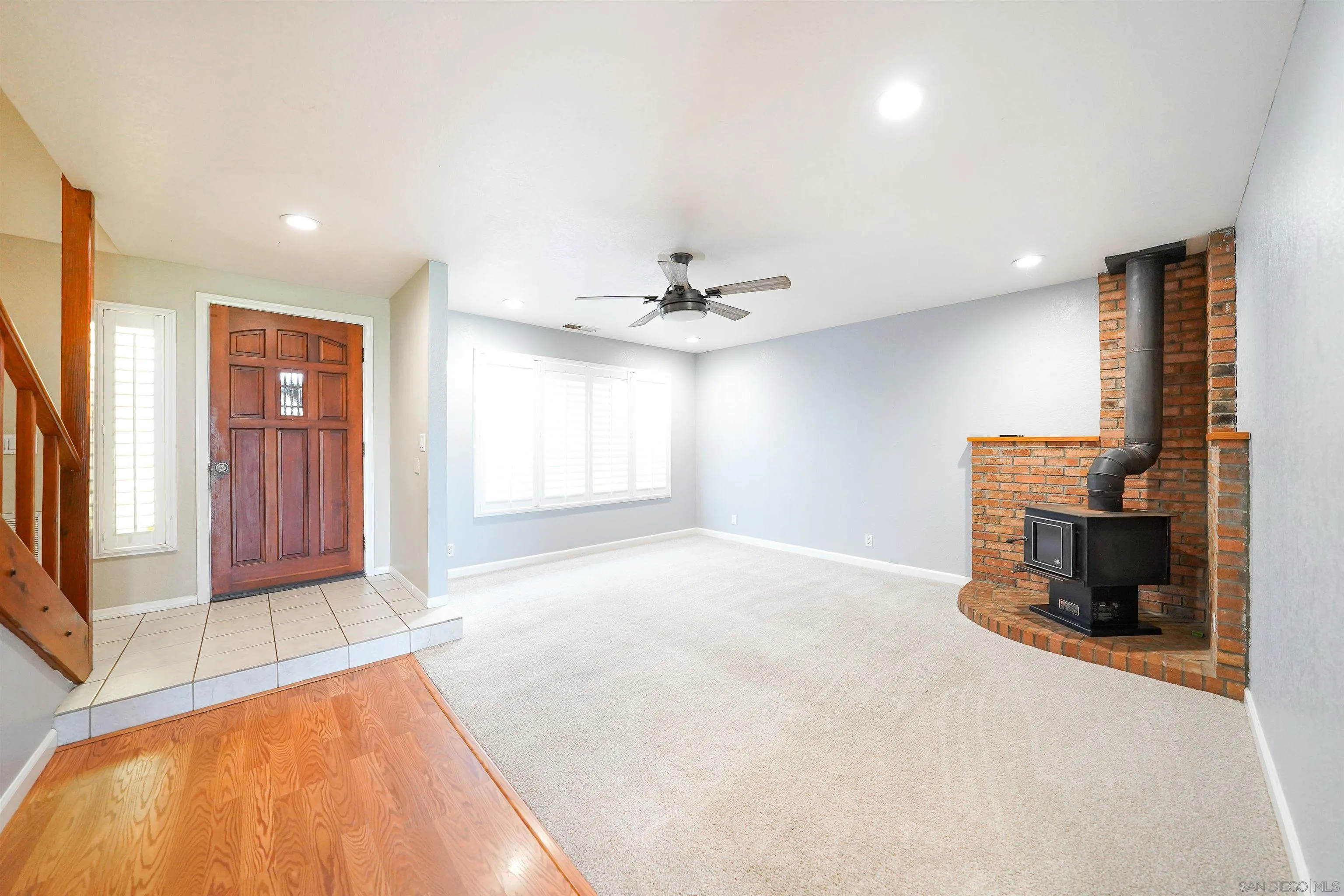 1465 Barnett Road Ramona, CA 92065 - Photo 14 of 43 a view of livingroom with hardwood floor and a ceiling fan