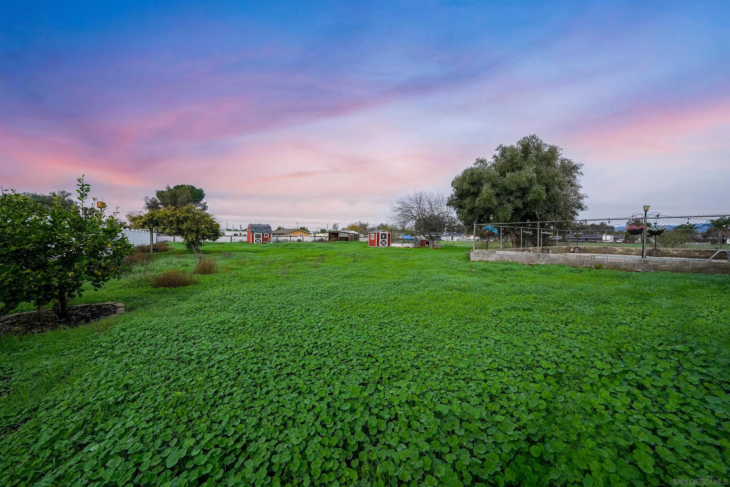 1465 Barnett Road Ramona, CA 92065 - Photo 38 of 43 a backyard of a house with table and chairs