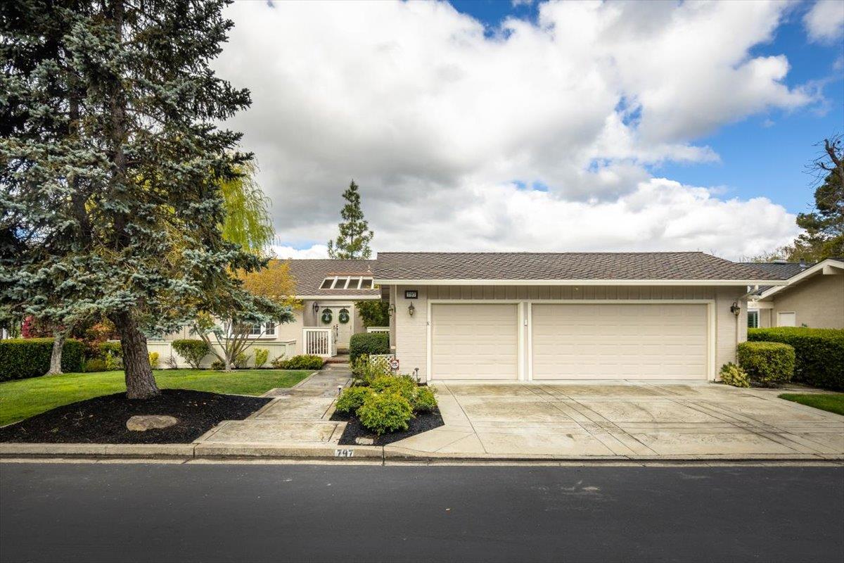 797 St George Road Danville, CA 94526 - Photo 1 of 52 a front view of a house with a yard and garage