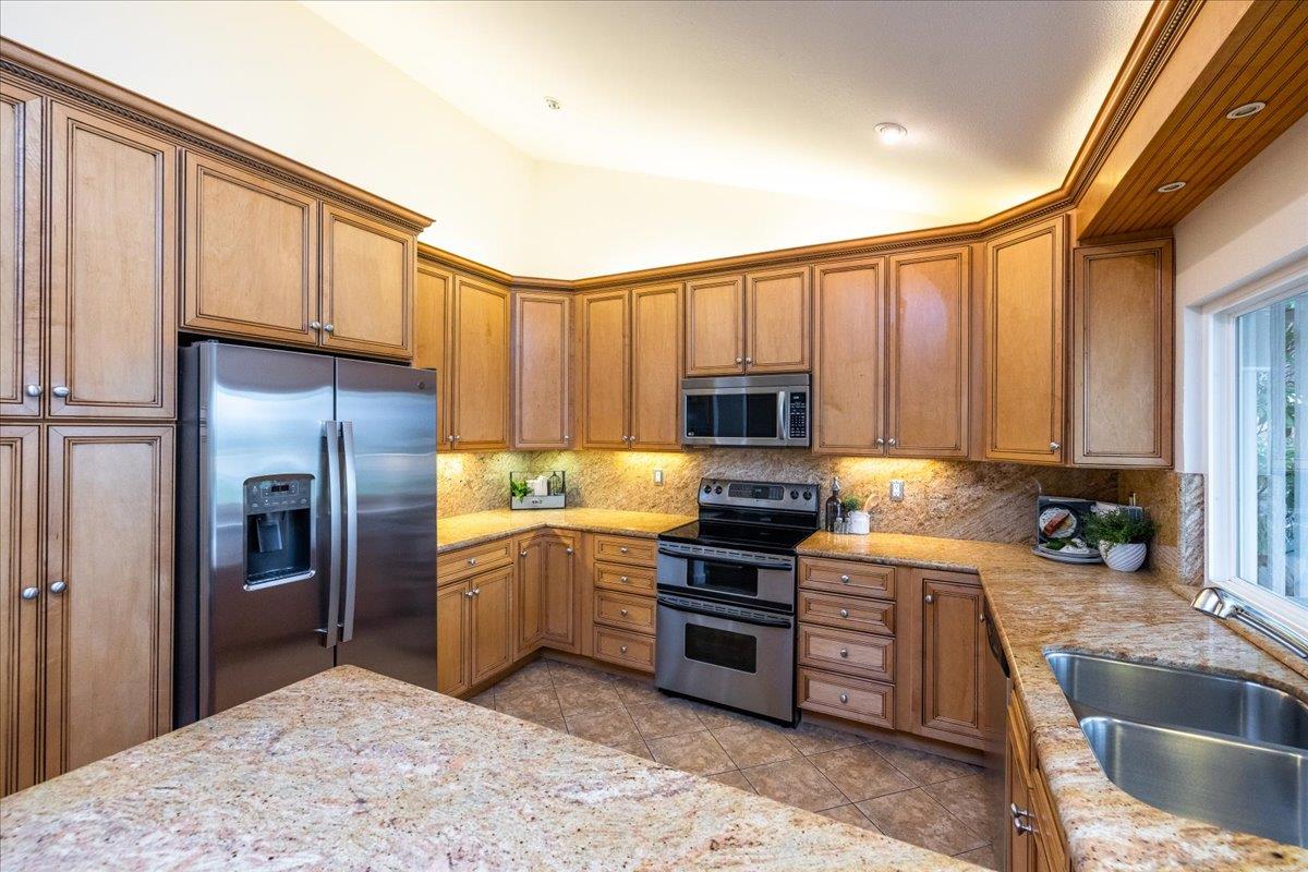 797 St George Road Danville, CA 94526 - Photo 12 of 52 a kitchen with stainless steel appliances granite countertop a stove a sink and a refrigerator
