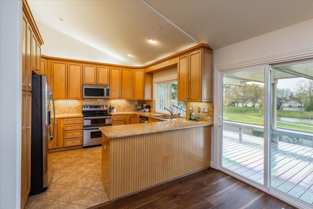 797 St George Road Danville, CA 94526 - Photo 13 of 52 a kitchen with stainless steel appliances a stove top oven