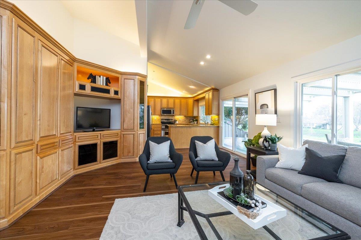 797 St George Road Danville, CA 94526 - Photo 14 of 52 a living room with furniture wooden floor and a flat screen tv