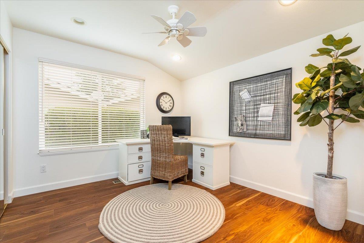 797 St George Road Danville, CA 94526 - Photo 23 of 52 a bedroom with a bed and a chandelier