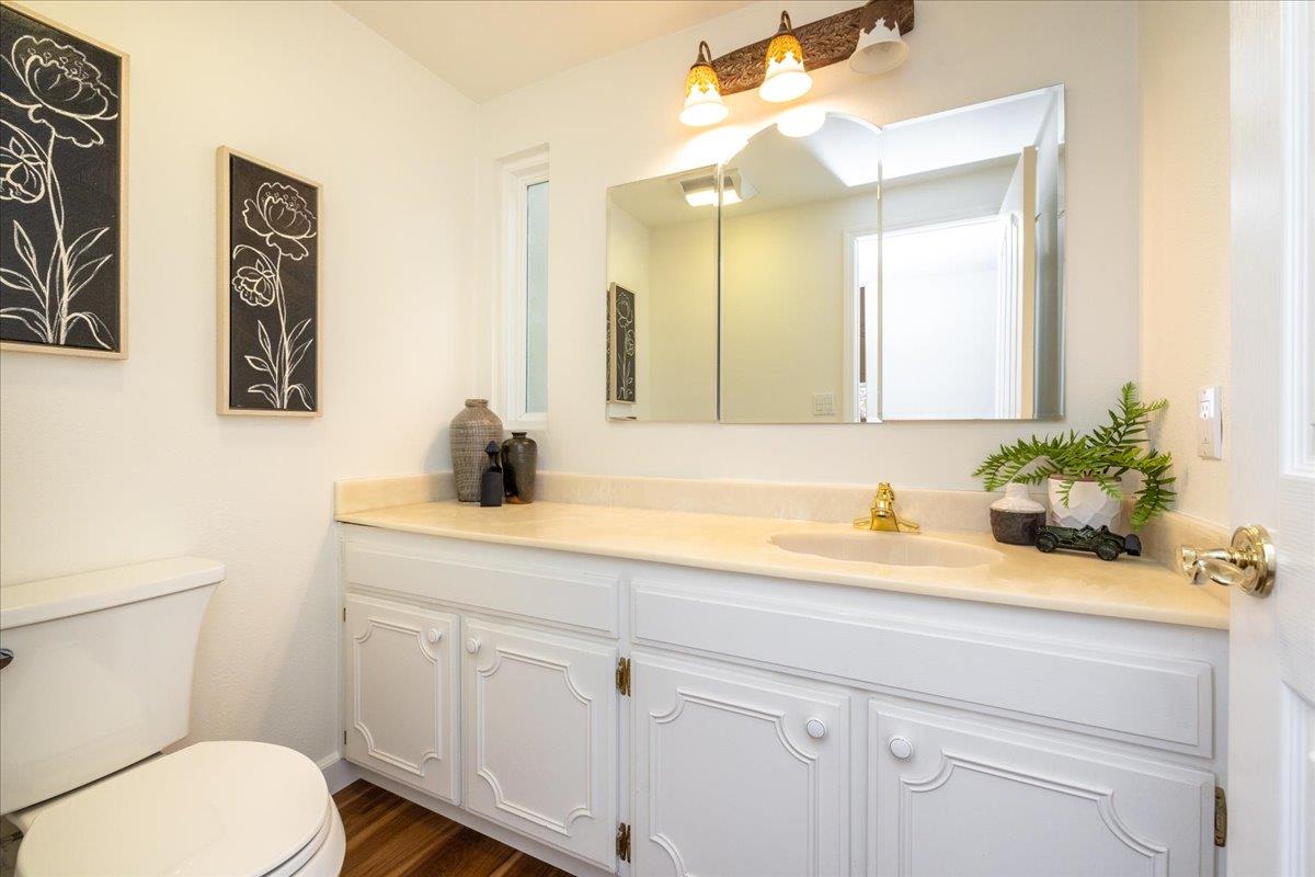 797 St George Road Danville, CA 94526 - Photo 24 of 52 a bathroom with a sink a toilet and a mirror