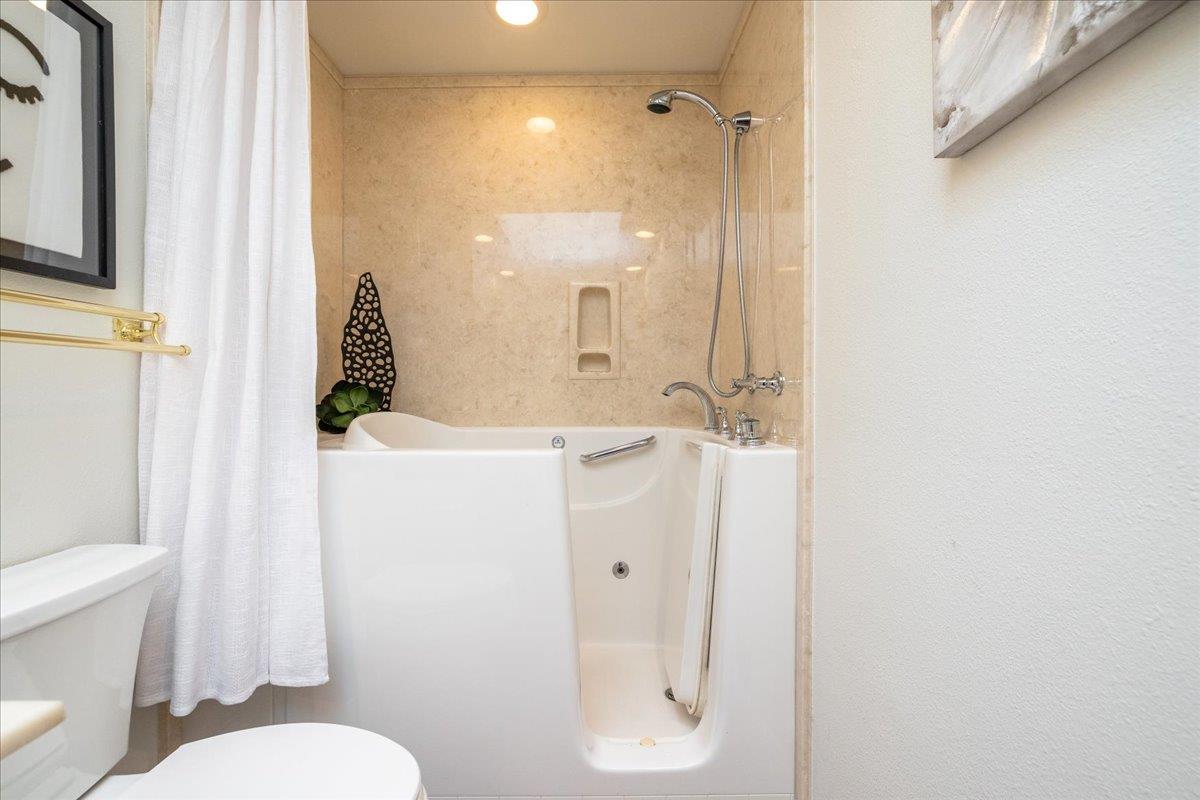 797 St George Road Danville, CA 94526 - Photo 26 of 52 a bathroom with a sink toilet and shower