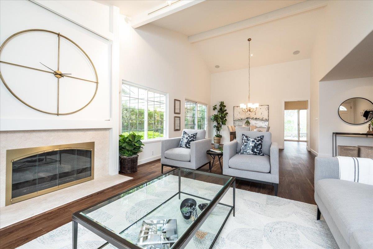 797 St George Road Danville, CA 94526 - Photo 7 of 52 a living room with furniture a fireplace and a floor to ceiling window
