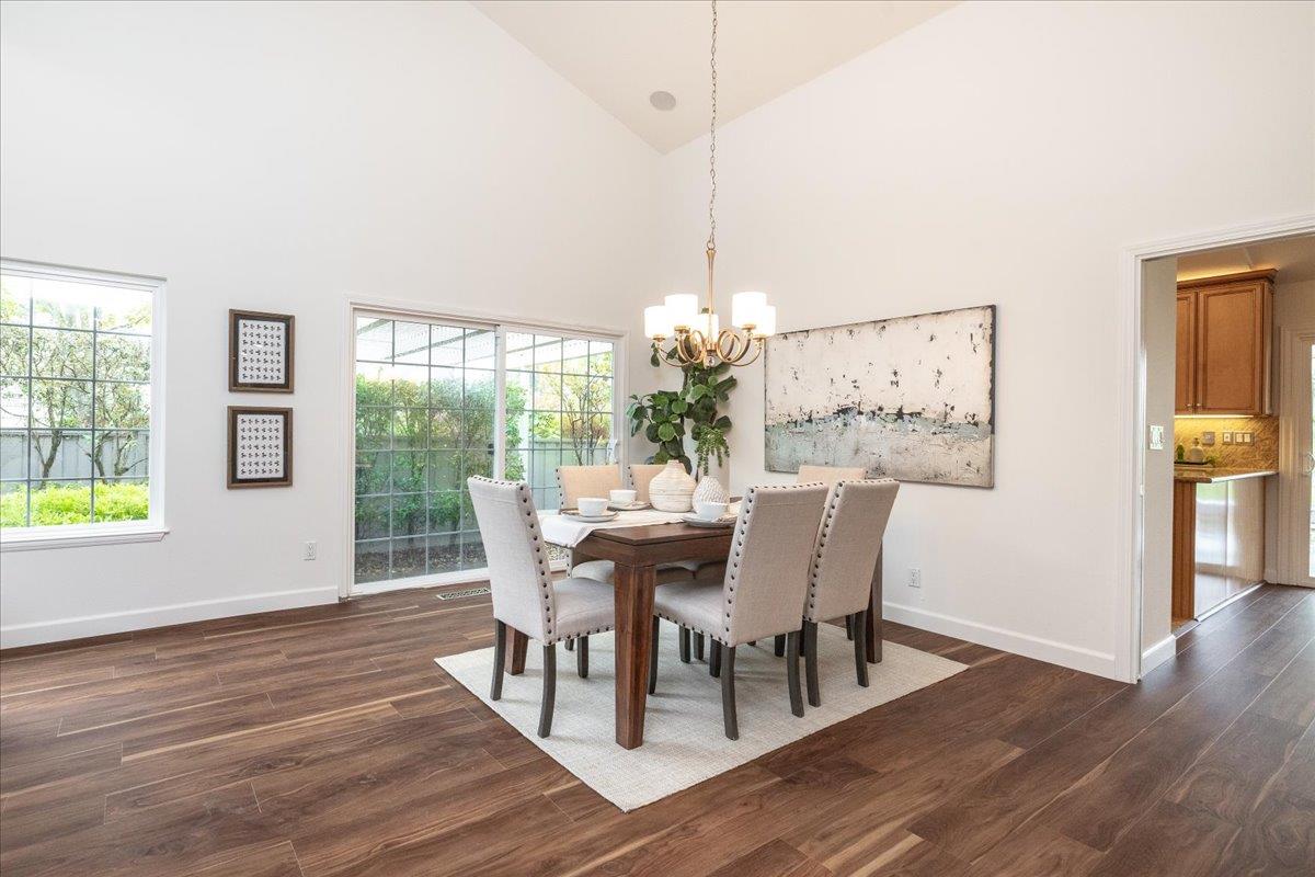 797 St George Road Danville, CA 94526 - Photo 9 of 52 a dining room with furniture a chandelier and wooden floor