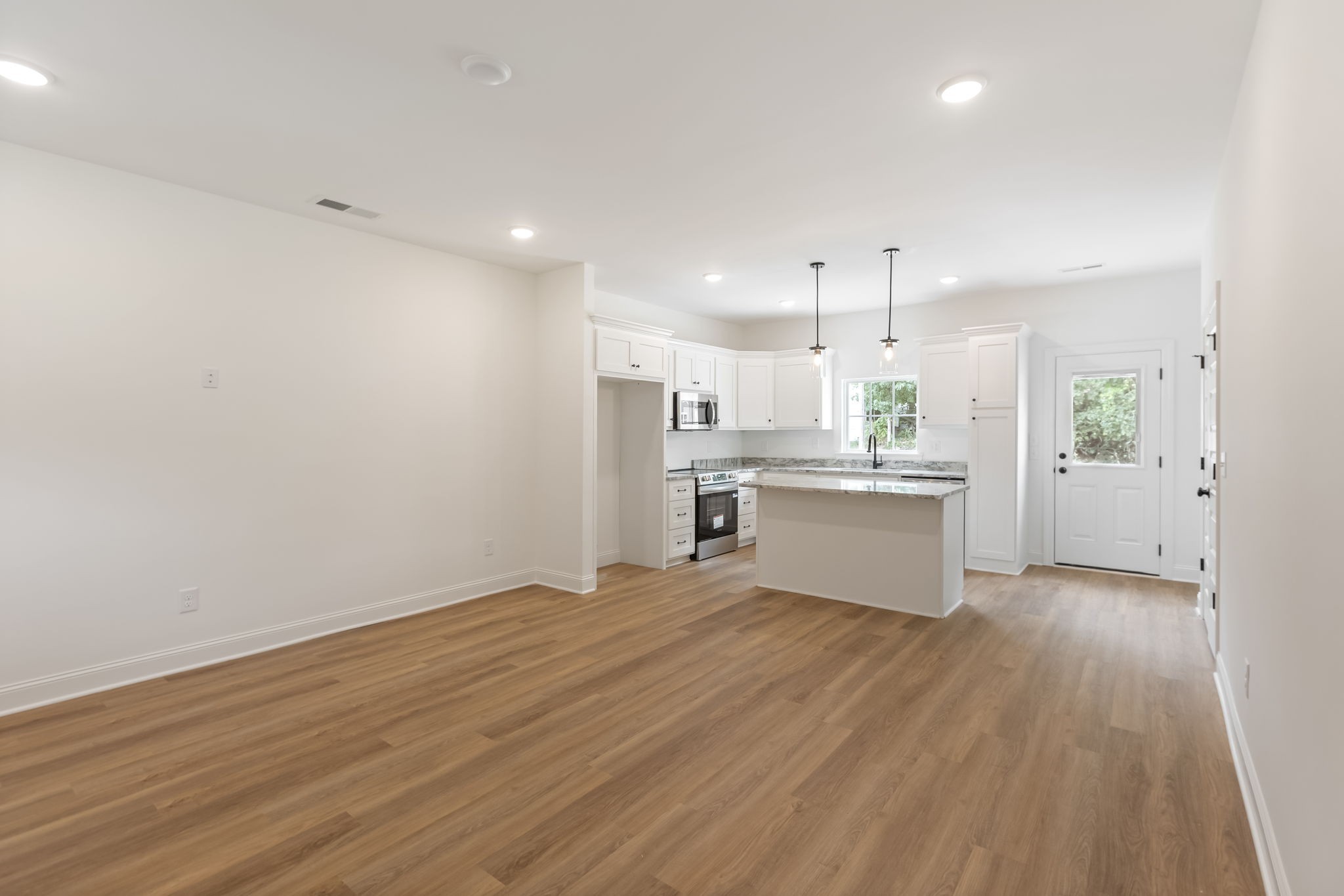 410 Hatcher Lane Columbia, TN 38401 - Photo 4 of 10 a view of kitchen with wooden floor