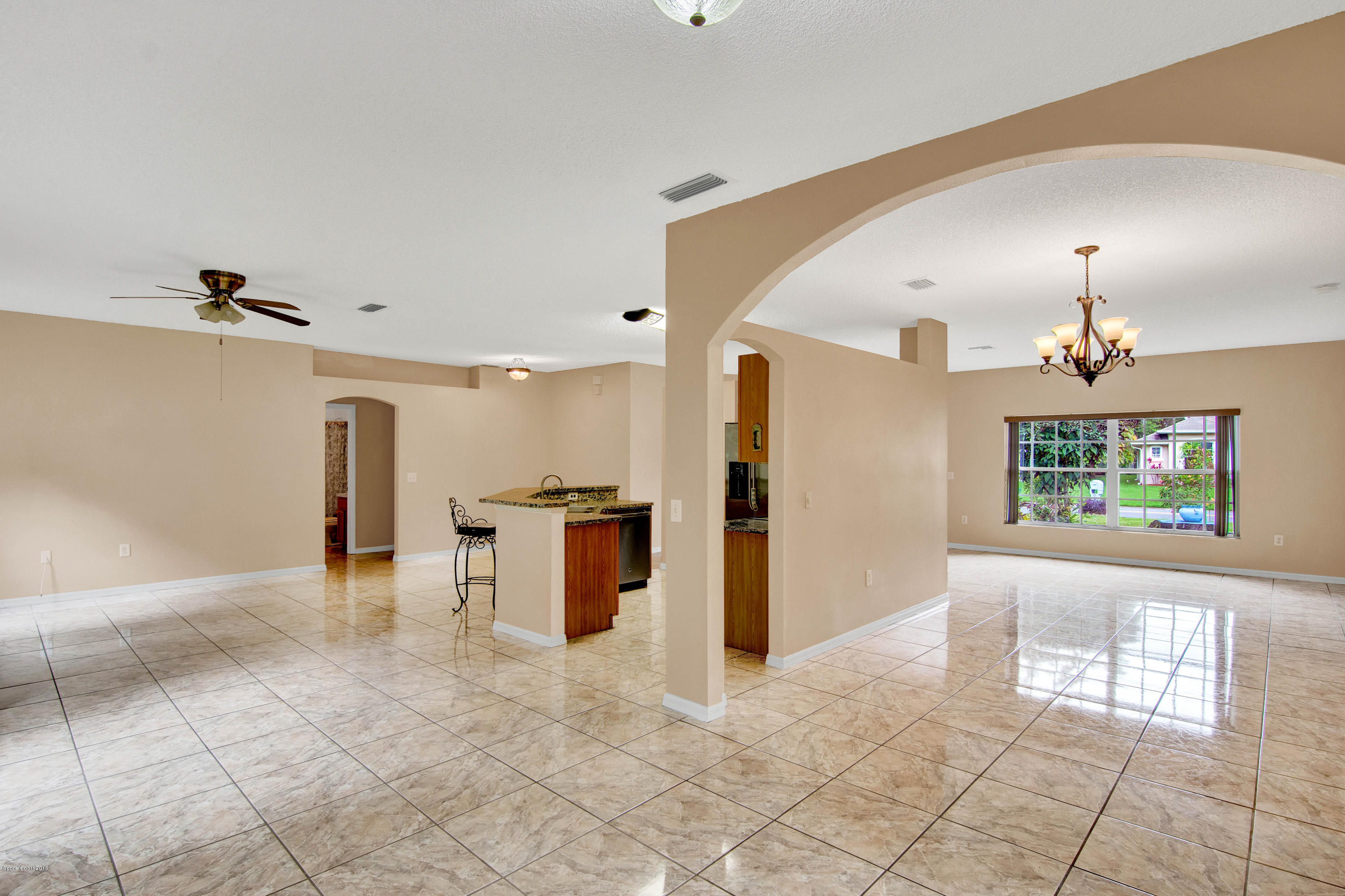 1030 Meadowbrook Road Northeast Palm Bay, FL 32905 - Photo 2 of 24 a view of a livingroom with a furniture