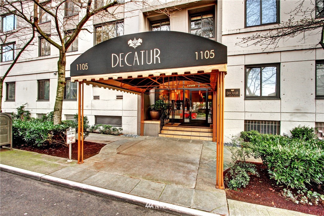 1105 Spring Street, Unit 610 Seattle, WA 98104 - Photo 2 of 12 a view of a street sign
