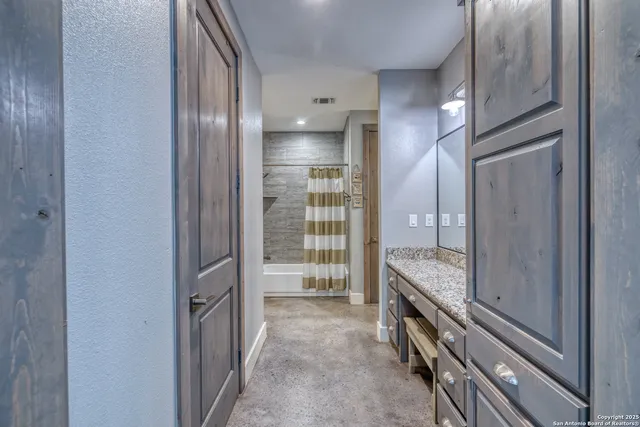 a bathroom with a shower curtain