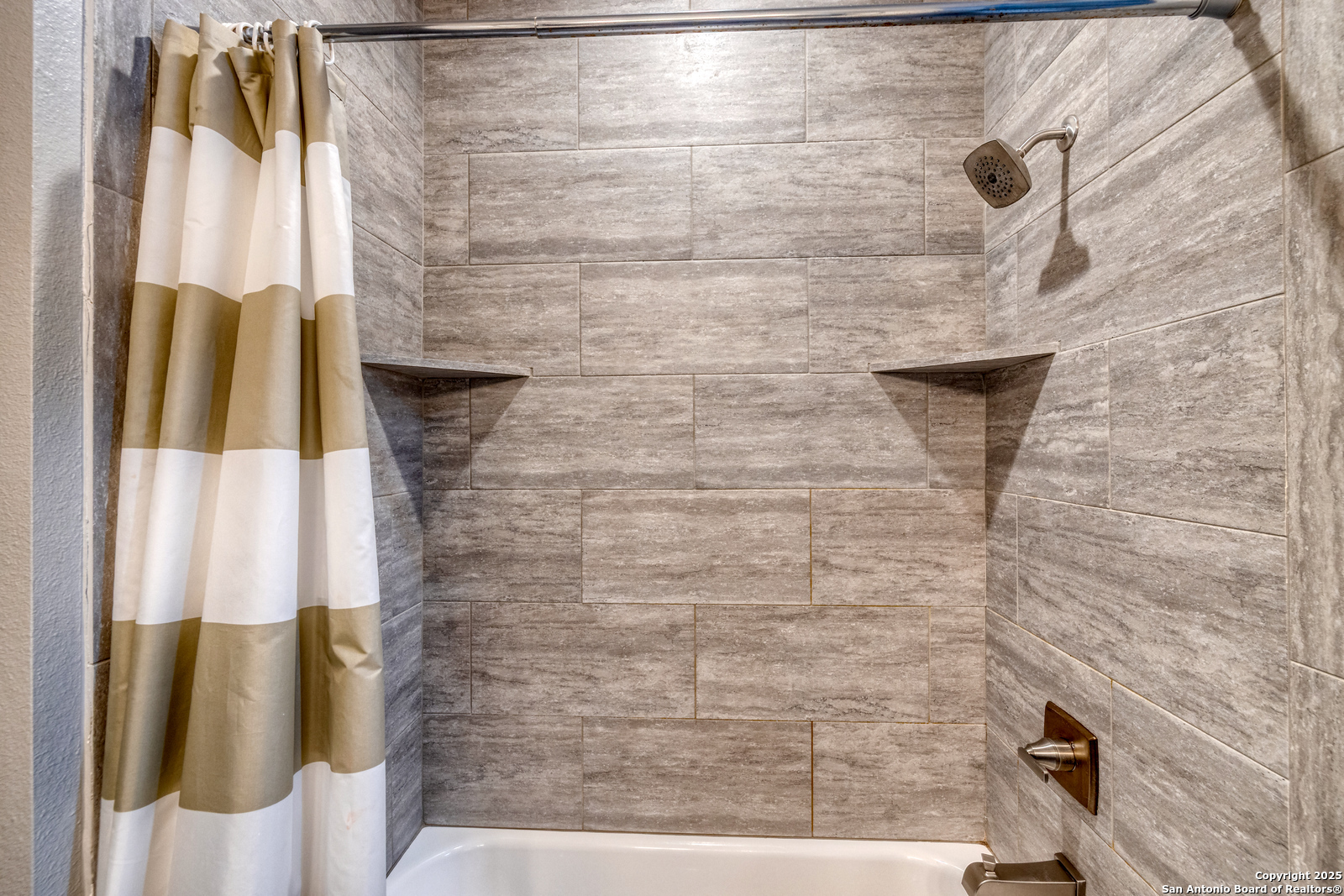 989 Mountain Valley Road Concan, TX 78838 - Photo 24 of 35 a bathroom with a shower