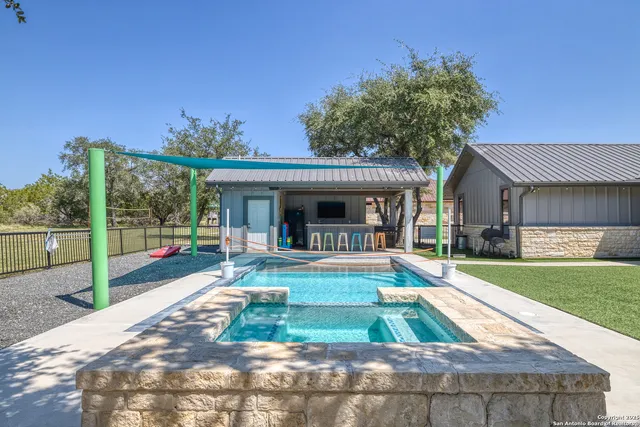 an aerial view of house with yard