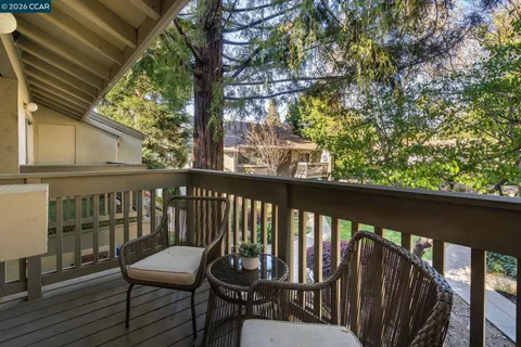 a view of a two chair in the balcony
