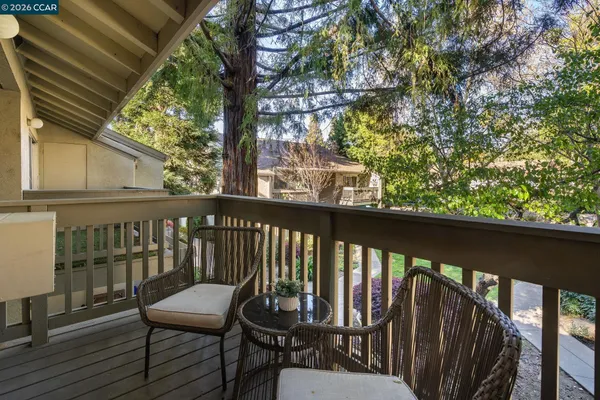 a view of a two chair in the balcony