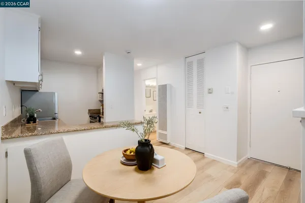 a kitchen with a sink and a refrigerator