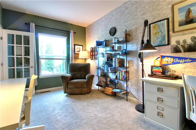 a room with furniture and a window