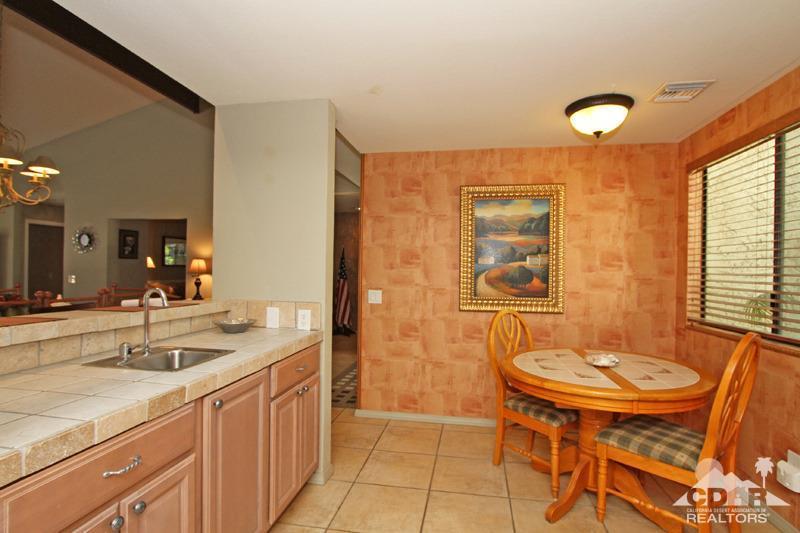 4 Kevin Lee Lane Rancho Mirage, CA 92270 - Photo 14 of 53 a bathroom with a sink double vanity and a mirror