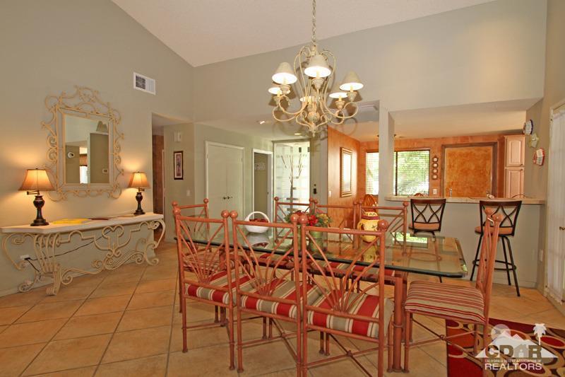 4 Kevin Lee Lane Rancho Mirage, CA 92270 - Photo 18 of 53 a view of a dining room with furniture and chandelier