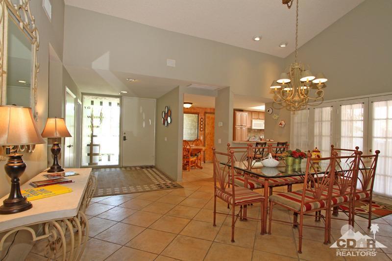4 Kevin Lee Lane Rancho Mirage, CA 92270 - Photo 19 of 53 a view of a dining room with furniture and chandelier