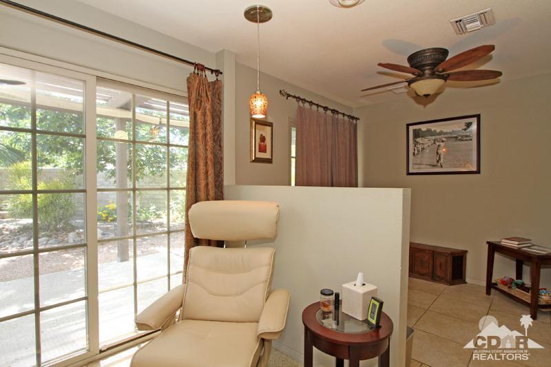 4 Kevin Lee Lane Rancho Mirage, CA 92270 - Photo 25 of 53 a living room with furniture and a large window