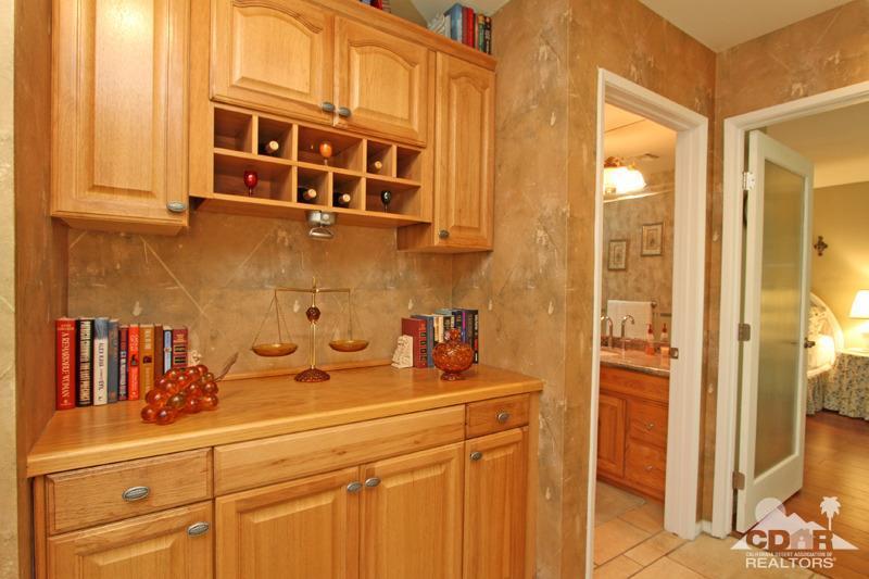 4 Kevin Lee Lane Rancho Mirage, CA 92270 - Photo 26 of 53 a bathroom with a sink and a mirror