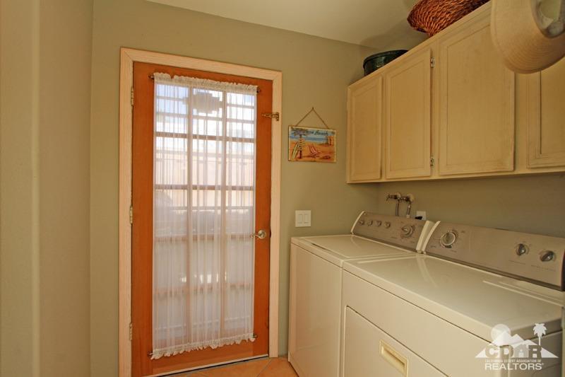 4 Kevin Lee Lane Rancho Mirage, CA 92270 - Photo 36 of 53 a utility room with dryer and washer