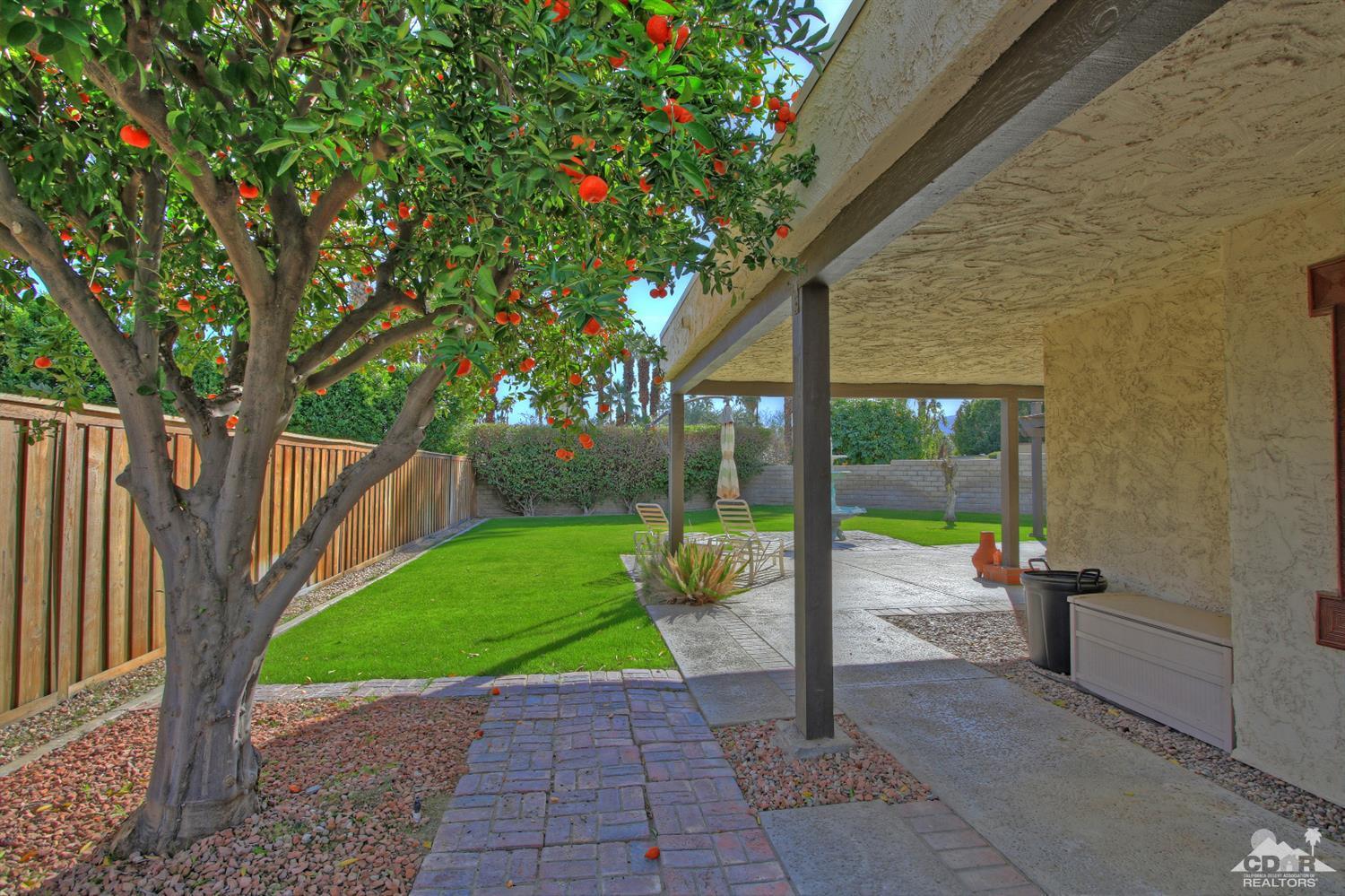 4 Kevin Lee Lane Rancho Mirage, CA 92270 - Photo 43 of 53 a view of a swimming pool with a patio