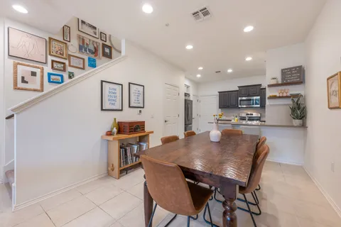 a view of a dining room with furniture